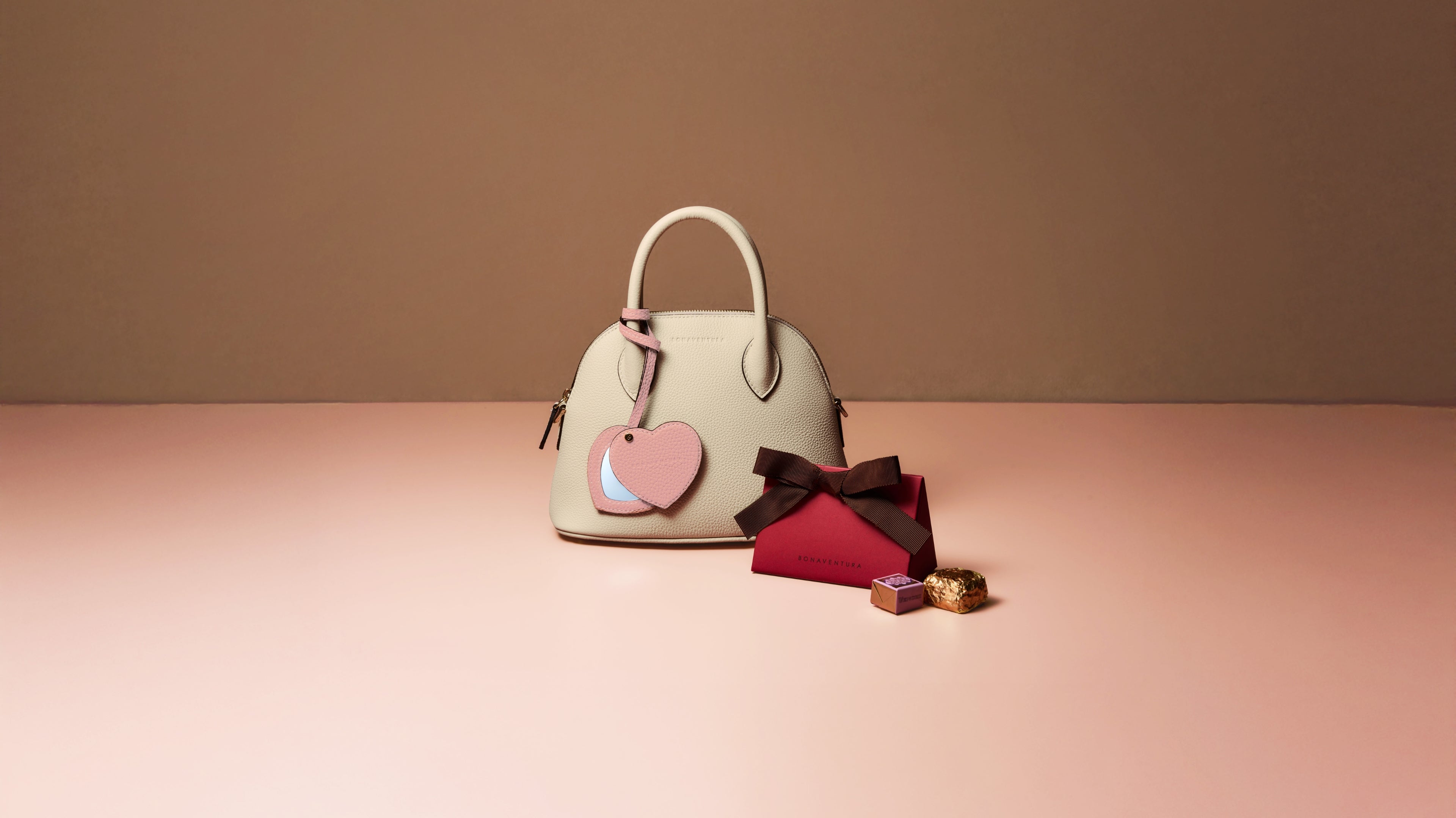 Timeless Valentine’s Day leather gifts in neutrals and soft shades of pink