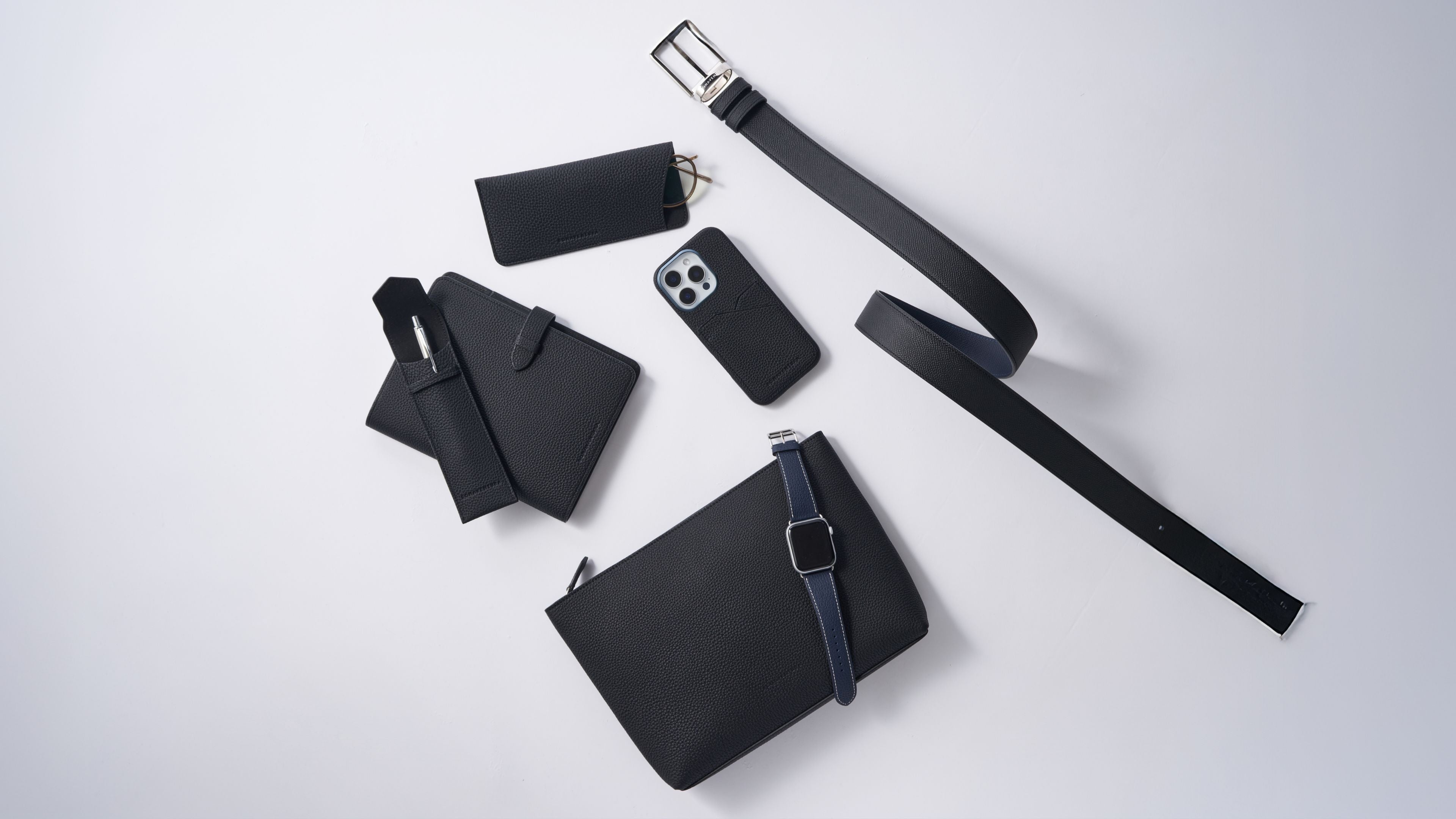 Luxury corporate gift selection featuring refined leather accessories